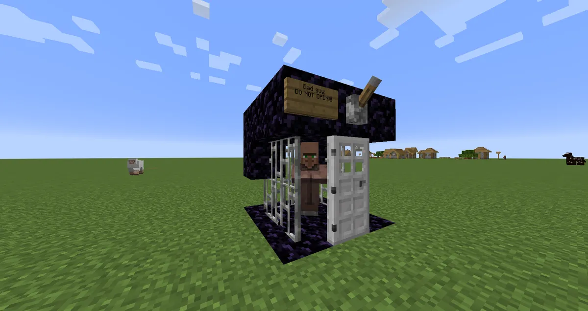 A villager locked in a small cell of obsidian and iron bars with an iron door, under a sign that reads Bad Guy DO NOT OPEN, on a flat grass world with a village in the distance