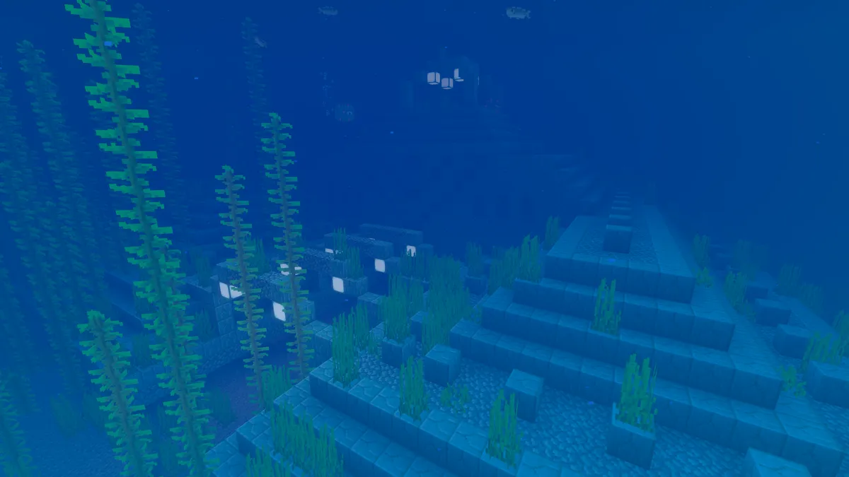 An ocean monument deep under water, its prismarine steps covered in seagrass and lit by sea lanterns, with tall kelp in front of it