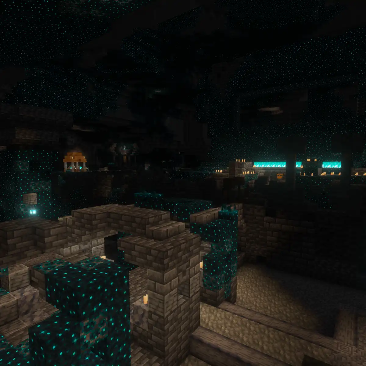 The ruins of an ancient city deep underground, with deepslate brick walls and arches covered in glowing blue sculk, a few candles in the dark and a long lit wall far in the distance